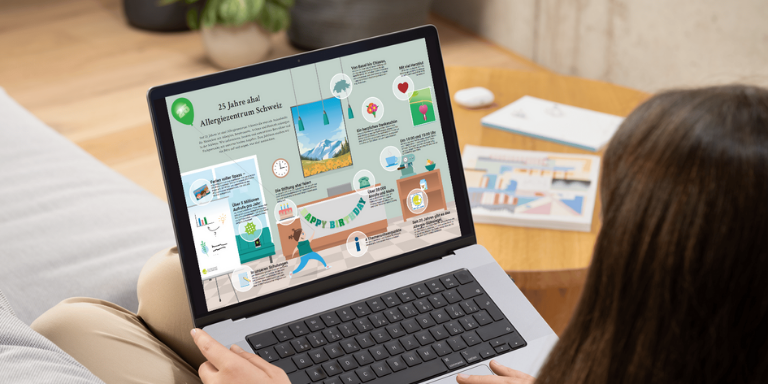 aha!-Infografik wird auf einem geöffneten Notebook angezeigt